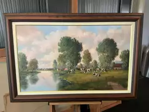 Olieverfschilderij ‘Landschap met grazende koeien aan rivier’ – H. Verlinden, met lijst (80×120 cm)