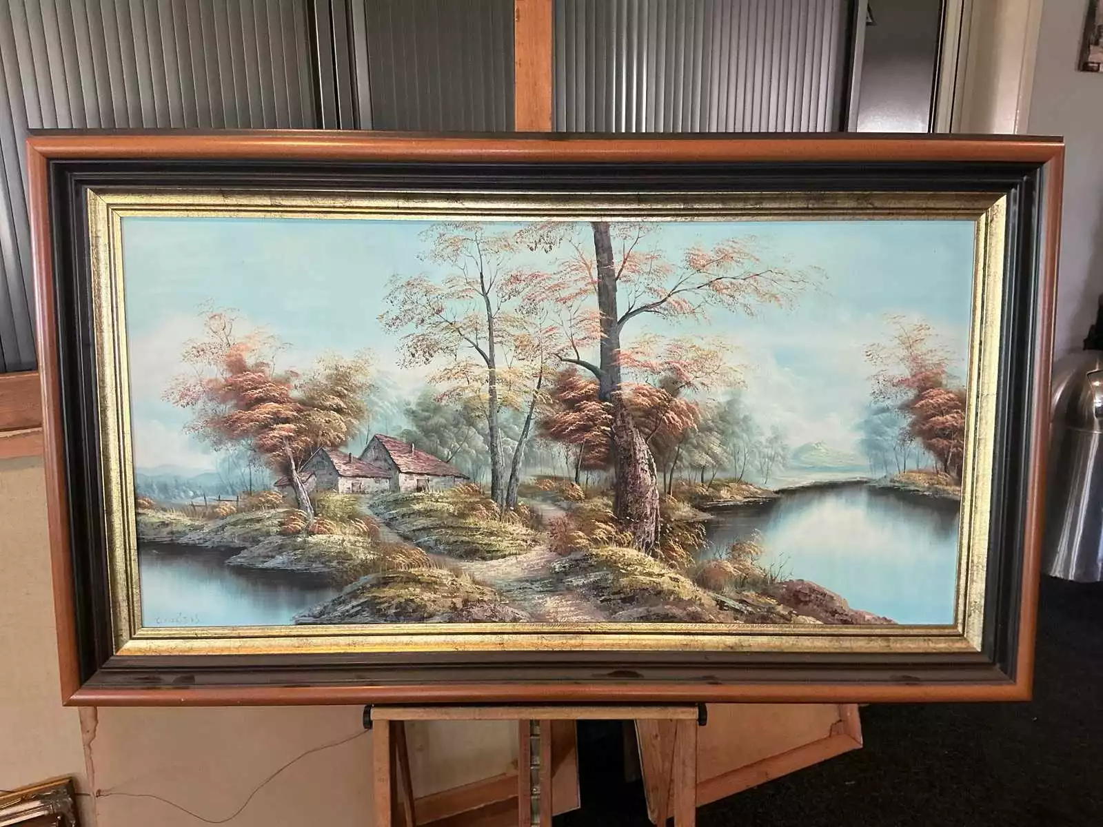 Olieverf ‘Rivierlandschap met boerderij’ – C. Inness, 19/20e eeuw, incl. lijst (82 x 142,5 cm)